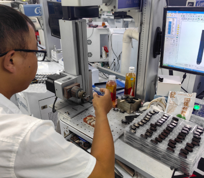 Worker operating machines with various items around