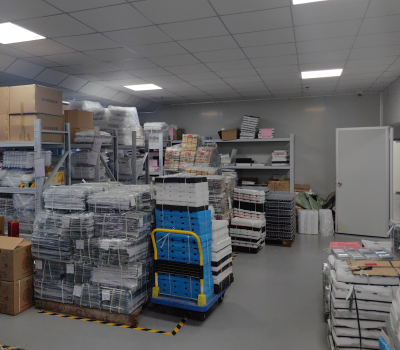 Warehouse filled with stacked shelves and boxes
