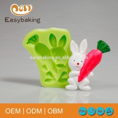 Pastel que adorna el molde de la galleta del silicón Conejo de Pascua lindo con el rábano