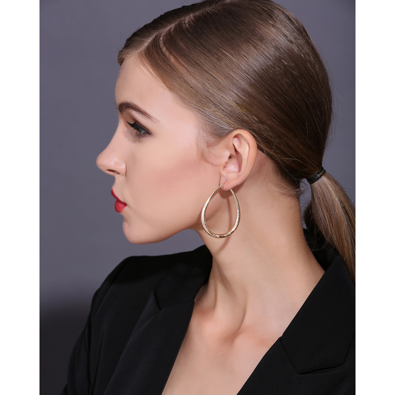Wholesale fashion elegant temperament 18k gold plated drop shape copper ladies earring Wholesale fashion elegant temperament 18k gold plated drop shape copper ladies earring