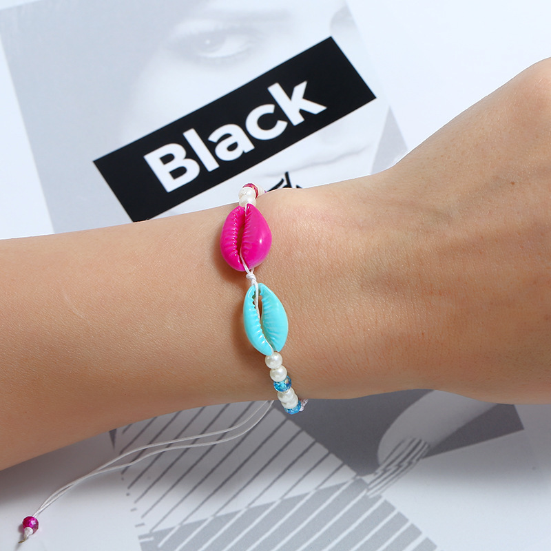 Bulk cheap unique hand modern woven pearl crystal cowrie sea shell bracelet for women