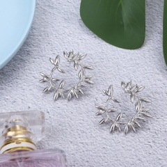 2020 jewelry earrings new creative hollow alloy spray paint  flower stud earrings for women