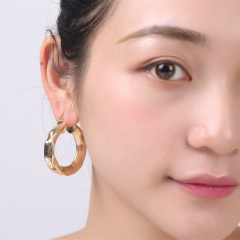 Fashion elegant circle women wrinkle twisted 18k gold plated hoop copper earrings