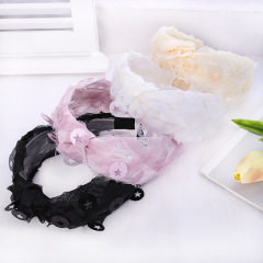 Wholesale custom fashionable round hollow star solid color fabric hairband for women