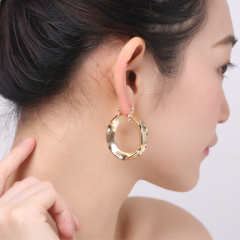 Fashion elegant circle women wrinkle twisted 18k gold plated hoop copper earrings