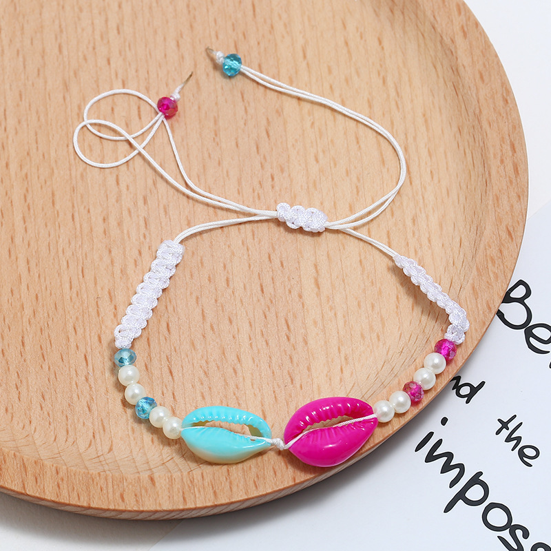 Bulk cheap unique hand modern woven pearl crystal cowrie sea shell bracelet for women