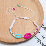 Bulk cheap unique hand modern woven pearl crystal cowrie sea shell bracelet for women