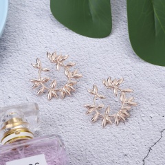 2020 jewelry earrings new creative hollow alloy spray paint  flower stud earrings for women
