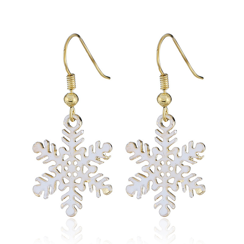 Wholesale White Alloy Paint Christmas Hollow Snowflake Earrings For Gifts Wholesale White Alloy Paint Christmas Hollow Snowflake Earrings For Gifts