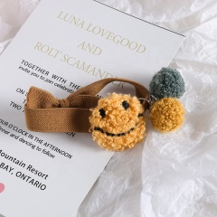 Hot sales autumn and winter smiling pattern plush headdress soft hair ties elastic from china