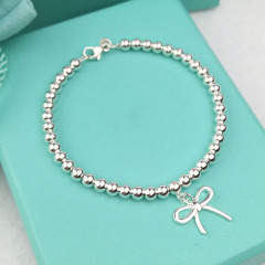 Free Sample Ladies Fashion Bow Knot Charm Sterling Silver Bead Bracelet