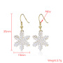 Wholesale White Alloy Paint Christmas Hollow Snowflake Earrings For Gifts Wholesale White Alloy Paint Christmas Hollow Snowflake Earrings For Gifts