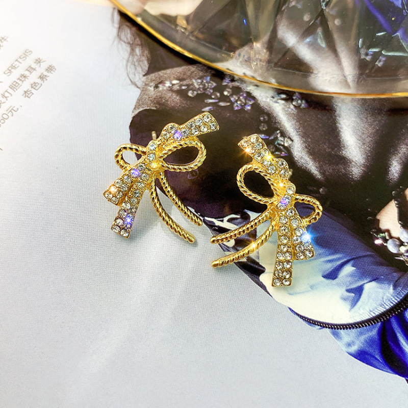 Wholesale Korea Bow Studded Zircon Crystal Gold S925 Silver Needle Fancy Stud Earring Wholesale Korea Bow Studded Zircon Crystal Gold S925 Silver Needle Fancy Stud Earring