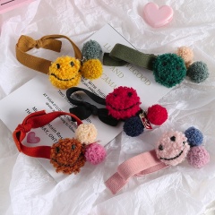 Hot sales autumn and winter smiling pattern plush headdress soft hair ties elastic from china