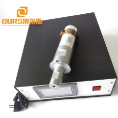 Uso del generador y del transductor ultrasónico de 20k 2000w para la máquina de soldadura ultrasónica del bolso del filtro de escritorio