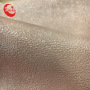 Embossed Surface And Woven Backing For Women Shoes