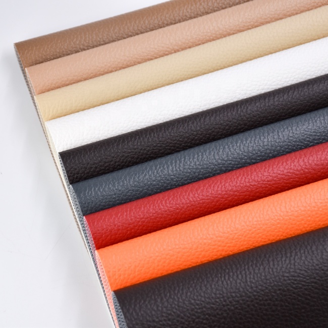 0.6mm Classical litchi design PVC leather with fish scale cloth backing for sofa