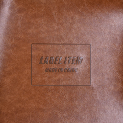 Parches de etiquetas de cuero de Pu en relieve con logotipo personalizado de estampado en caliente de alta calidad para jeans y bolsos
