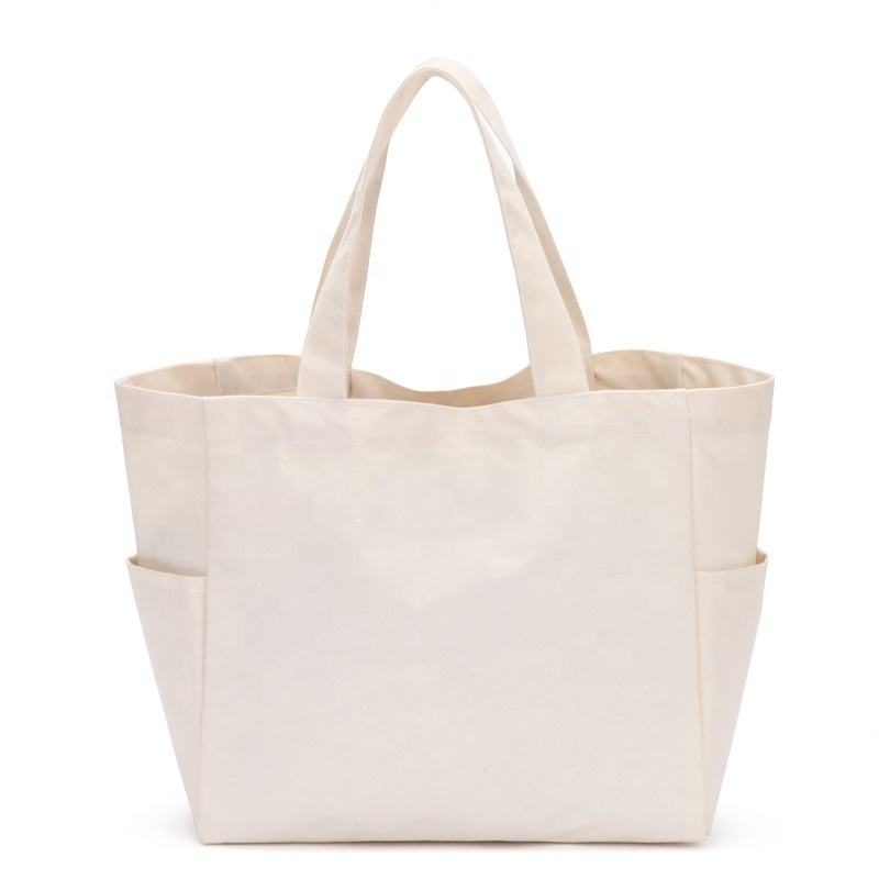 Wholesale eco friendly material custom 100% cotton canvas multi pockets foldable shopping bag grocery bags canvas reusable bags