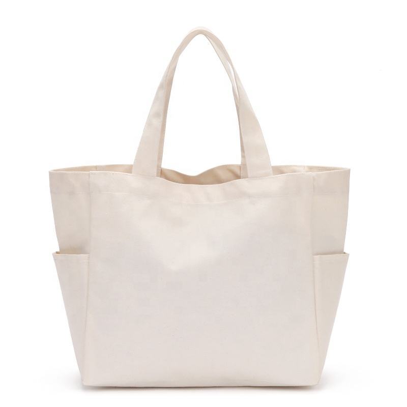 Wholesale eco friendly material custom 100% cotton canvas multi pockets foldable shopping bag grocery bags canvas reusable bags