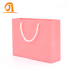 Wholesale spot goods custom luxury black shopping paper bag printing Amazon kraft gift packaging bag with logo print