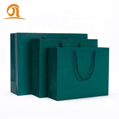 Ready made european luxury wide base paper bag for dress t-shirt packaging