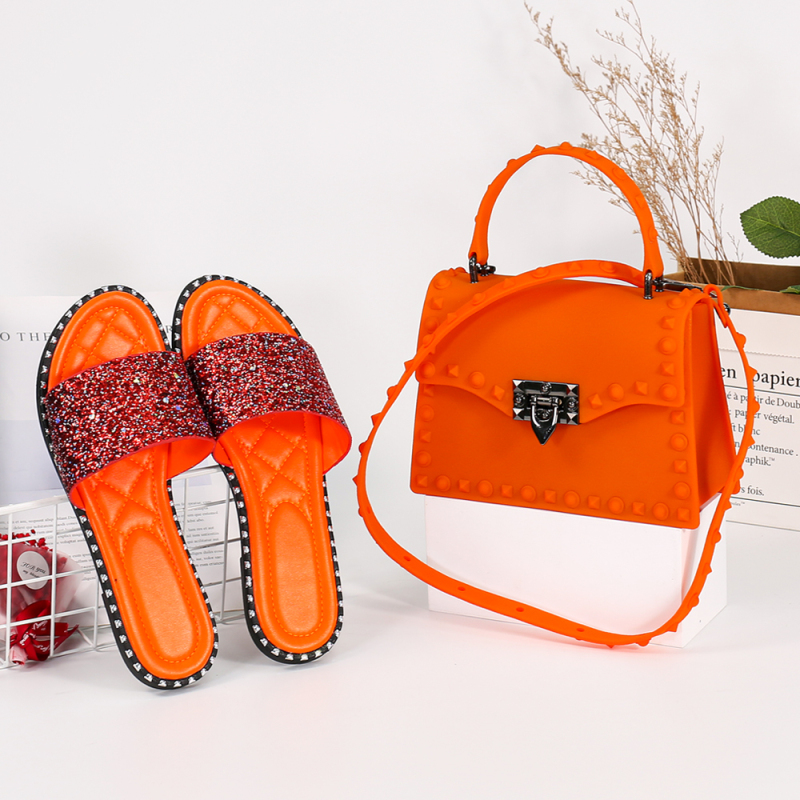 PVC Rivet Diagonal Handbag And PVC Ladies Slippers