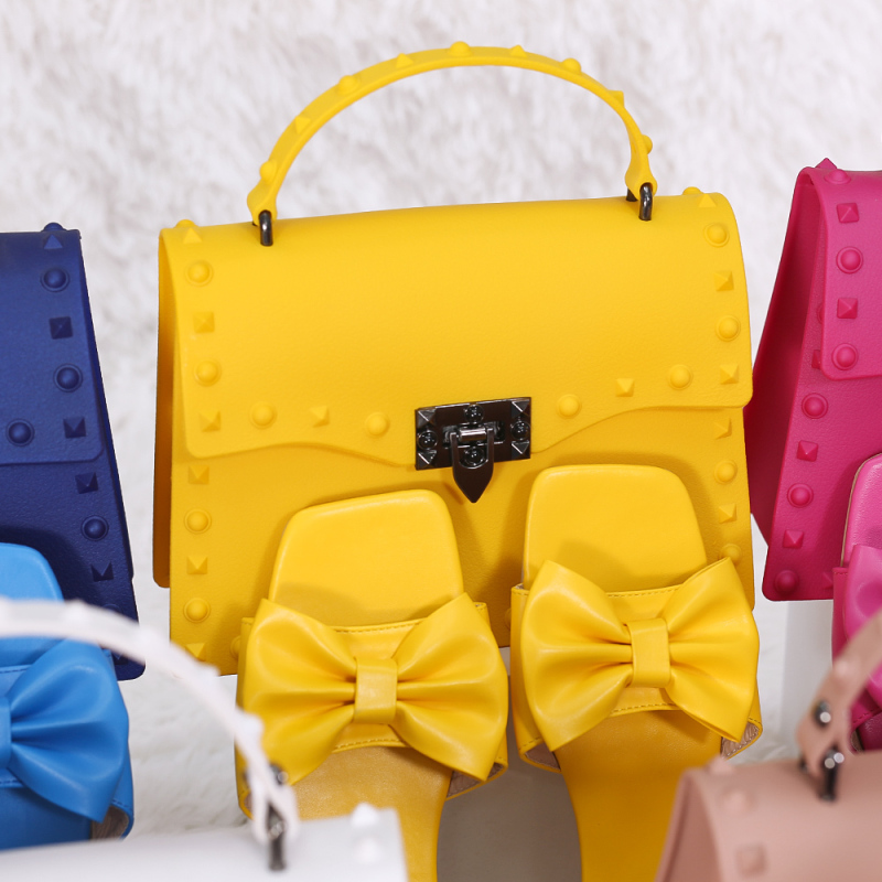 2021 New Personalized Trendy Pvc Jelly Bag Rivet Portable Crossbody Women Hand bags Purse And Shoes Bow Flat Sandals Set