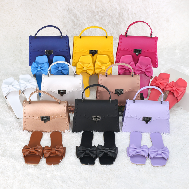 2021 New Personalized Trendy Pvc Jelly Bag Rivet Portable Crossbody Women Hand bags Purse And Shoes Bow Flat Sandals Set