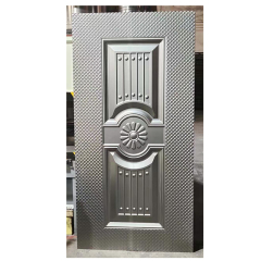 Decorative exterior mould stamped steel door skin panel