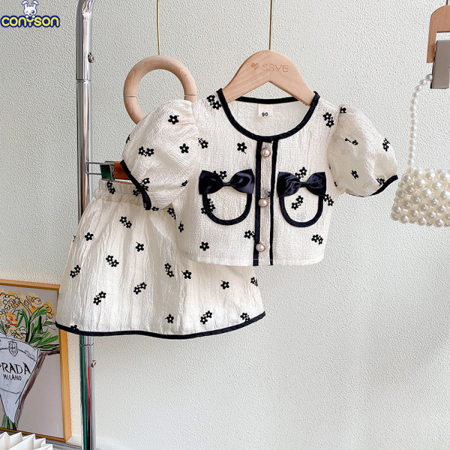 Conyson Factory Direct Summer Girls Stretch Black Bow Solid Color New Arrival Boutique Ruffled Flare Sleeve Girls Set