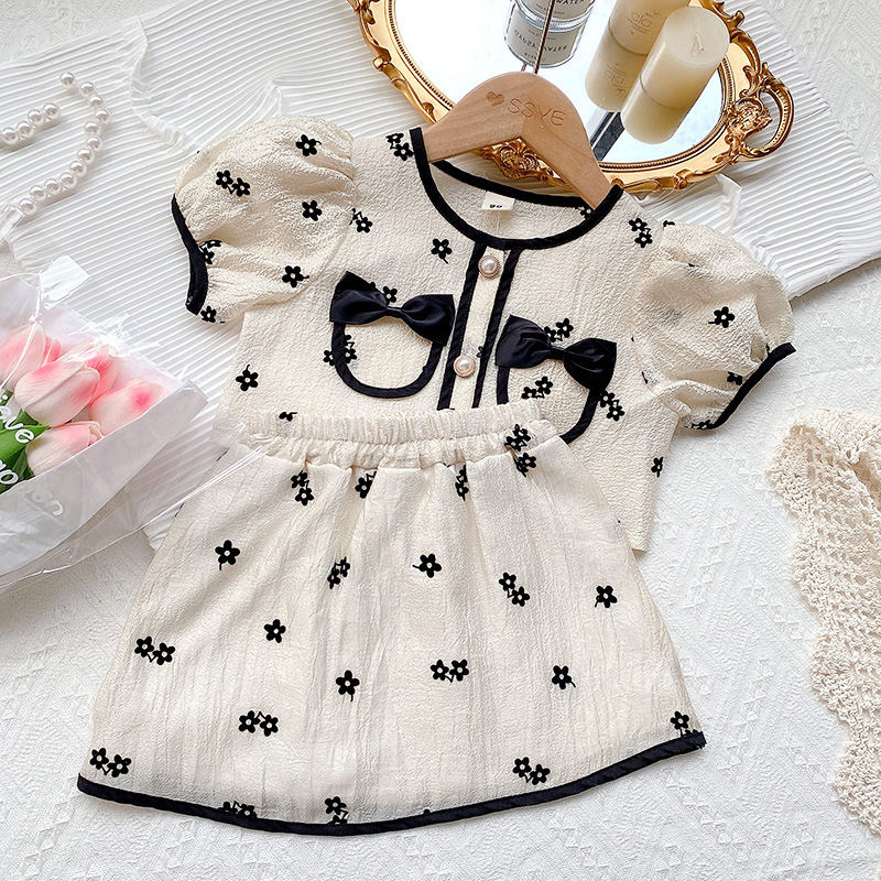 Conyson Factory Direct Summer Girls Stretch Black Bow Solid Color New Arrival Boutique Ruffled Flare Sleeve Girls Set