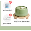 green fountain with wooden
