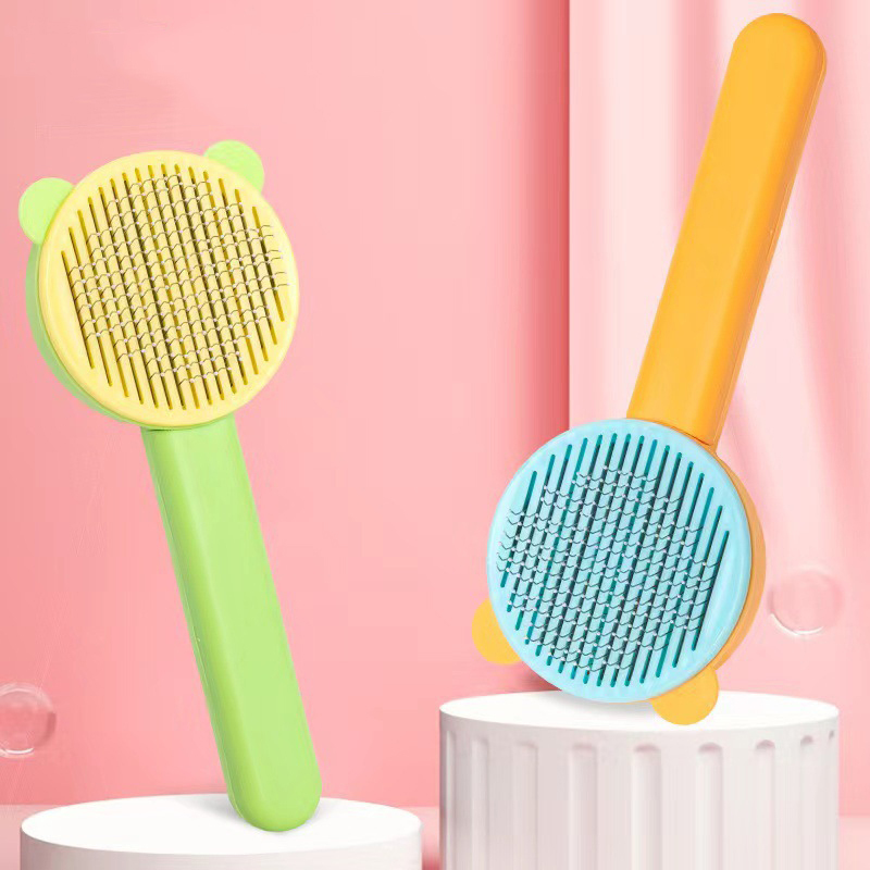 Manufacturer wholesale one button remove yellow green cheap dog cat comb