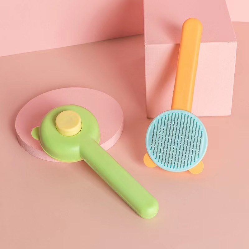 Manufacturer wholesale one button remove yellow green cheap dog cat comb