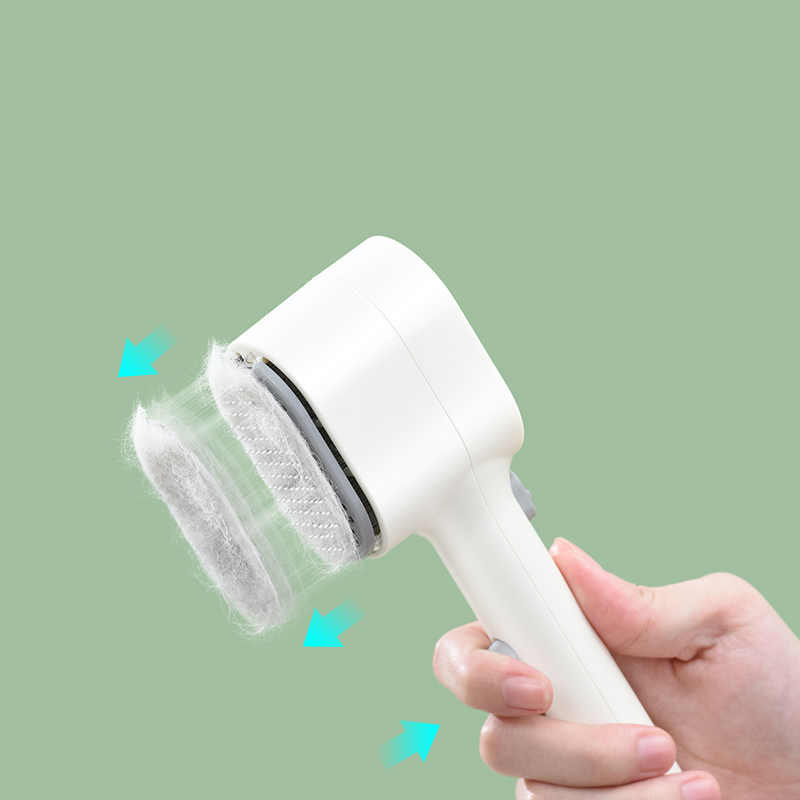 Manufacturer wholesale green white charging cat dog comb with LED light