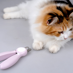Manufacturer wholesale pink white blue battery dog nail clippers with led light
