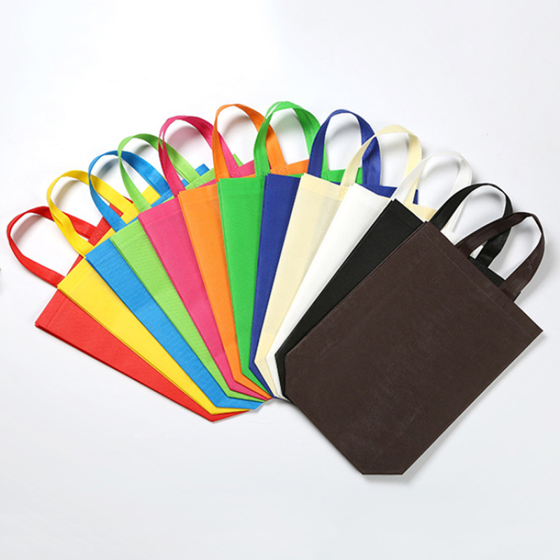 Stock blank promotional biodegradable eco friendly non woven bags for shopping with logo