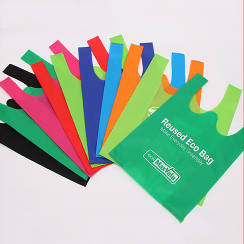 Factory wholesale eco reusable custom logo supermarket non woven w cut t shirt shopping bag
