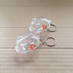 Promotional plastic piggy bank with key chain