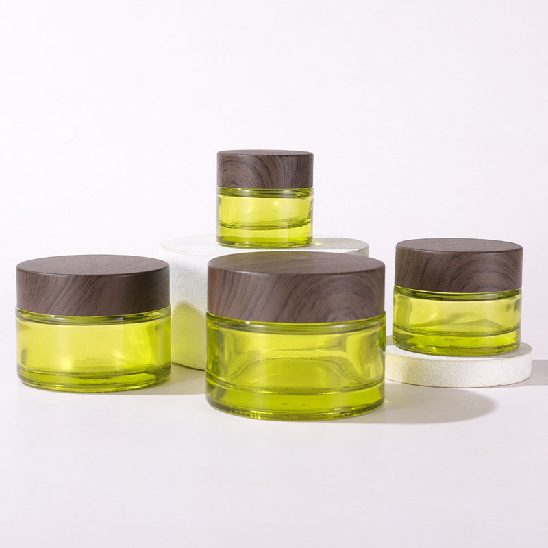 Elegant Cosmetic Jars Glass Container Wooden Transfer Printing Lids 50g