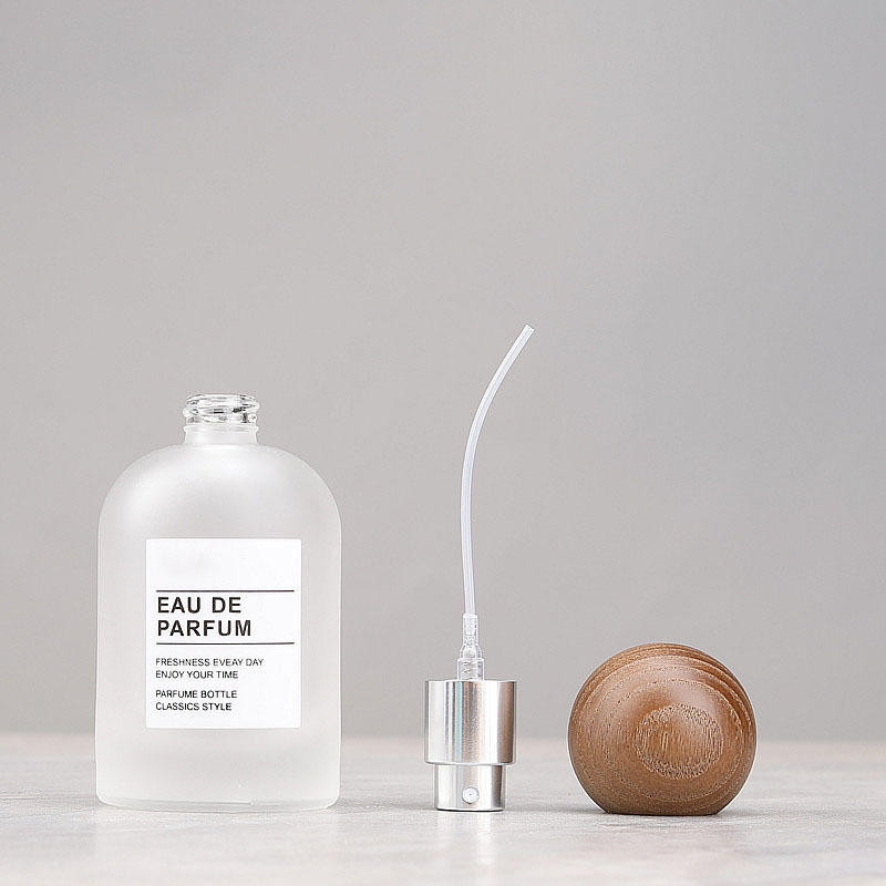 Custom 50ml Round Shape Empty Frosted Glass Perfume Bottle with Crimp Mist Spray