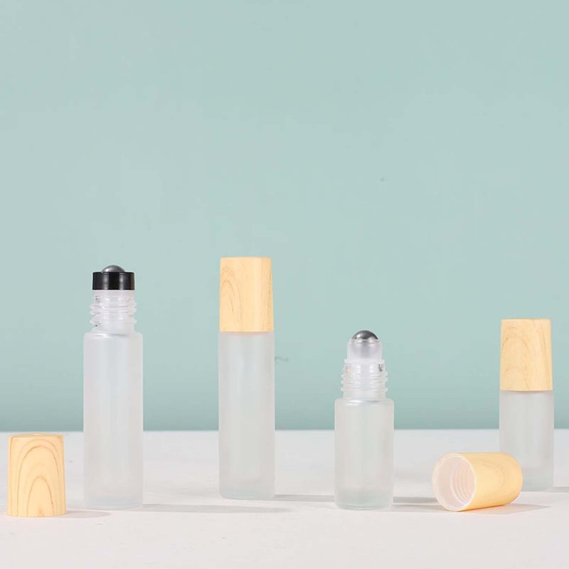 High Quality Essential Oil Bottle Glass Roller Bottles  Frosted Glass Bottle Wood Grain Lid