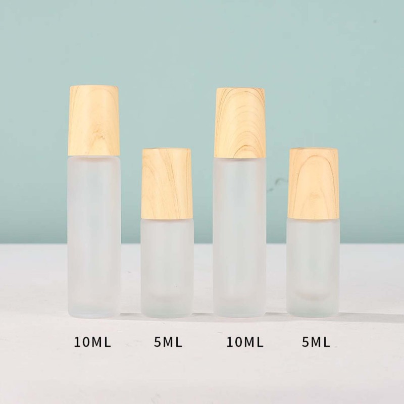 High Quality Essential Oil Bottle Glass Roller Bottles  Frosted Glass Bottle Wood Grain Lid