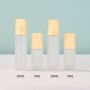 High Quality Essential Oil Bottle Glass Roller Bottles  Frosted Glass Bottle Wood Grain Lid