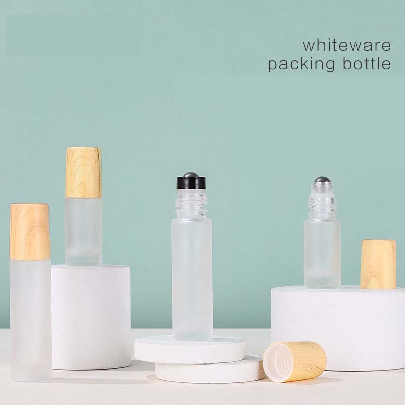 High Quality Essential Oil Bottle Glass Roller Bottles  Frosted Glass Bottle Wood Grain Lid