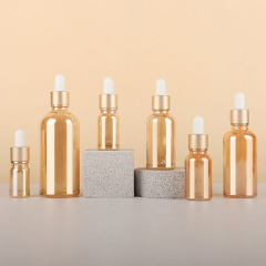 Wholesale Golden Glass Dropper Bottles 5ml 10ml 15ml 30ml 50ml 100ml Essential Oil Packaging with Matte Gold Cap