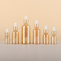 Wholesale Golden Glass Dropper Bottles 5ml 10ml 15ml 30ml 50ml 100ml Essential Oil Packaging with Matte Gold Cap