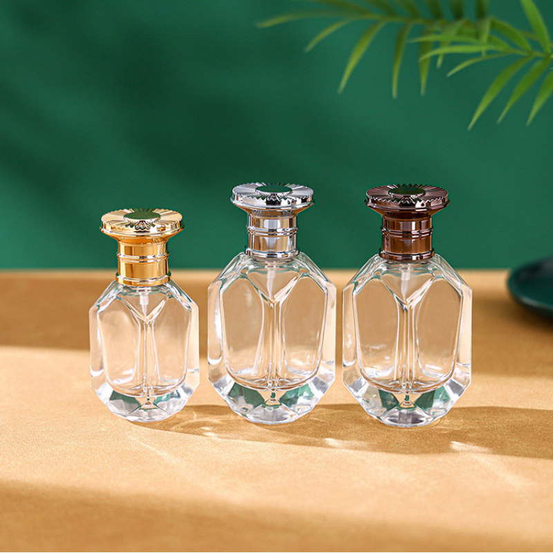 Unique Design Transparent Glass Perfume Bottle 30ml 50ml Gold Silver Black Sprayer with Round Metallic Cap