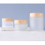 2024 New Style Very Popular Glass Jars Frosted clear  Glass Jars with Bamboo Lids for Cosmetic